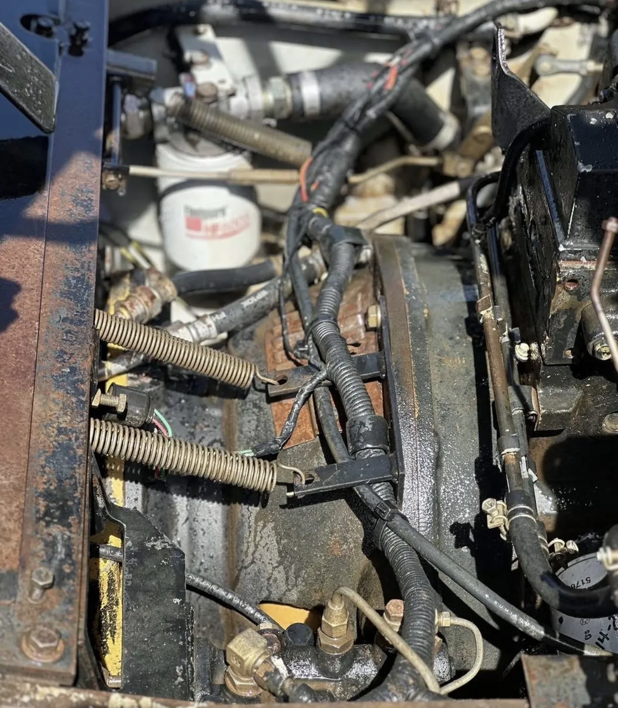 After: heavy equipment engine compartment caked in mud, degreased by B&H