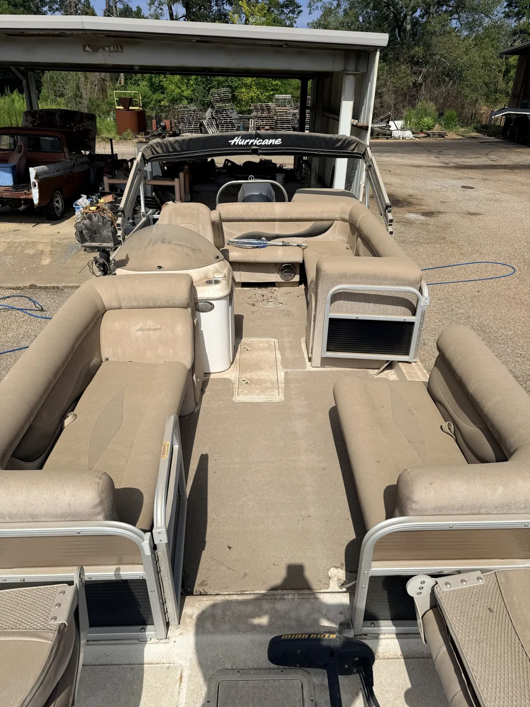 Before: pontoon boat deck and seats cleaned by B&H