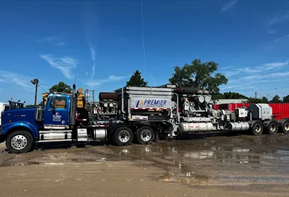 Pressure pumping trucks washed on an oilfield yard